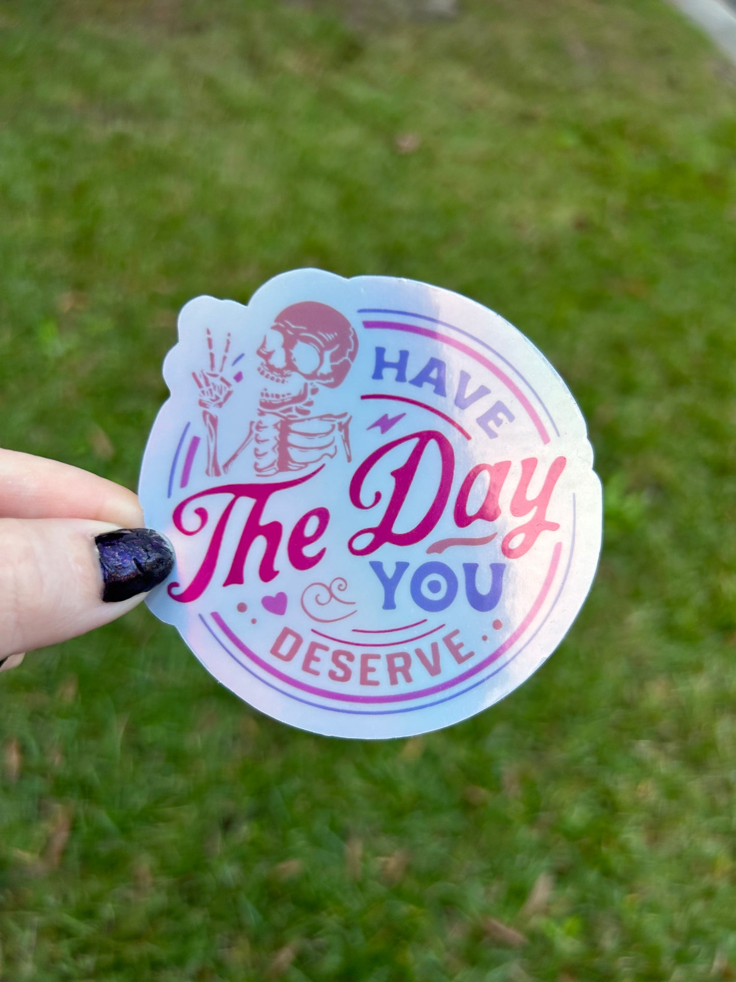 Have the Day you Deserve Holographic Sticker