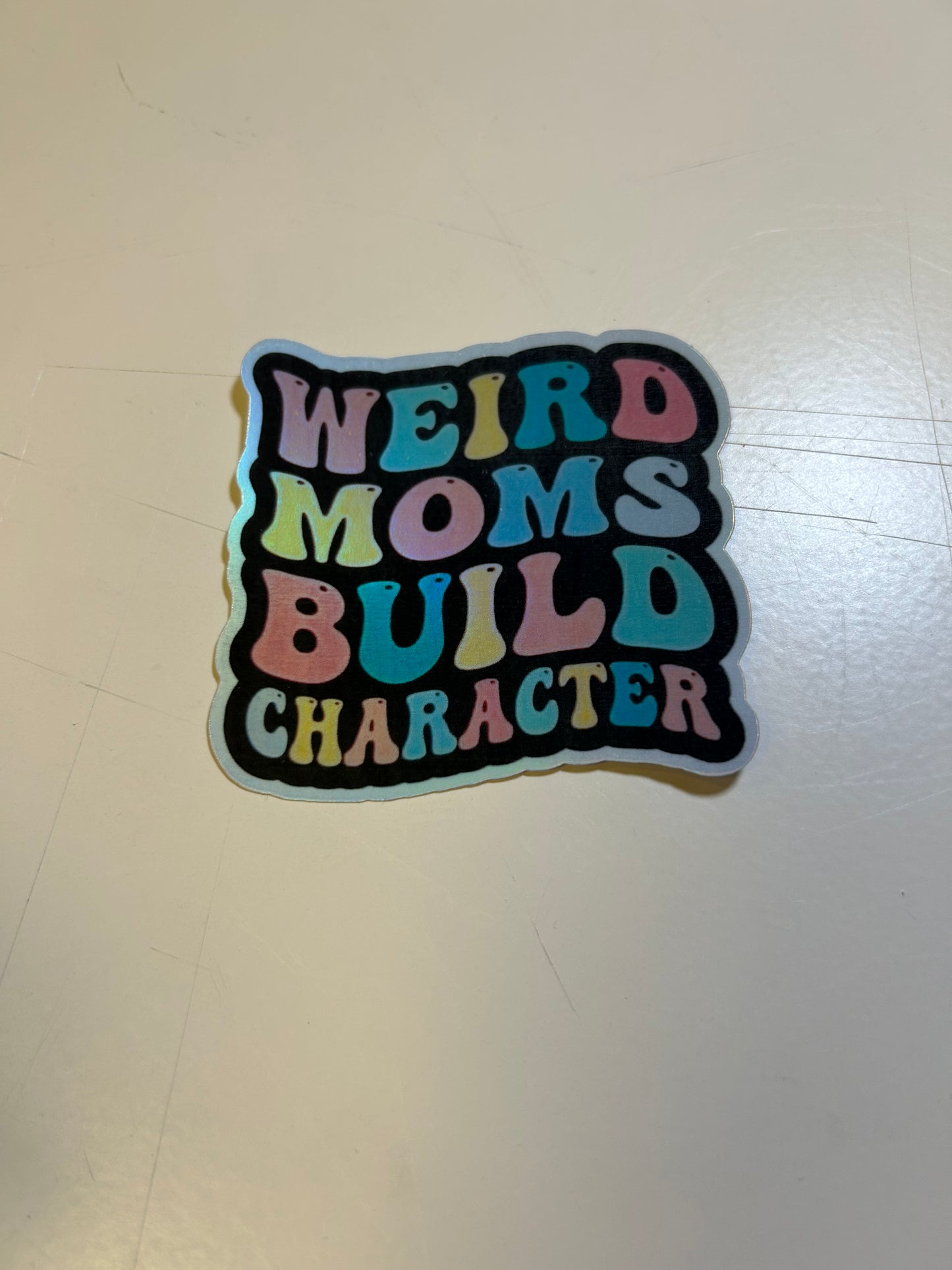 Weird Moms Build Character Holographic Sticker