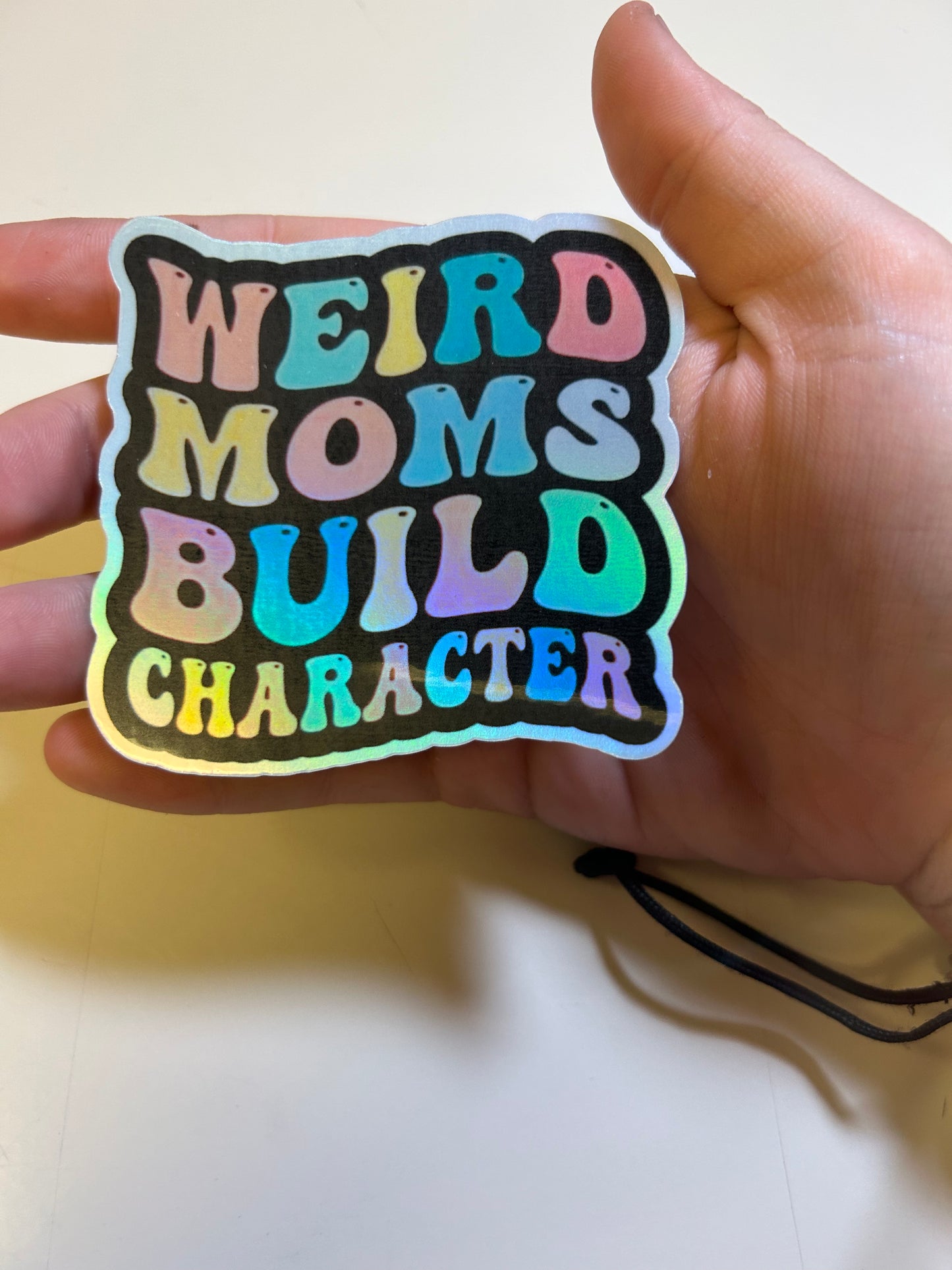 Weird Moms Build Character Holographic Sticker